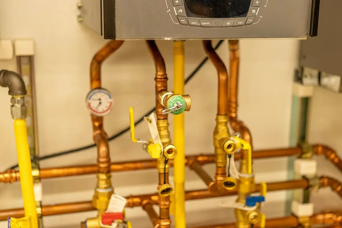 Licensed technician providing Water Heater Installation for a homeowner in Merton